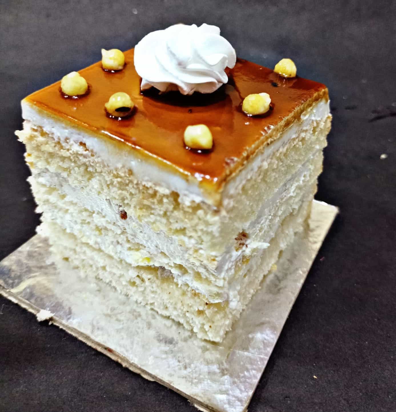 Butterscotch caramel cake. Soft eggless vanilla sponge with caramel sauce n  crunchy butterscotch nuts and frosted with whipped… | Instagram